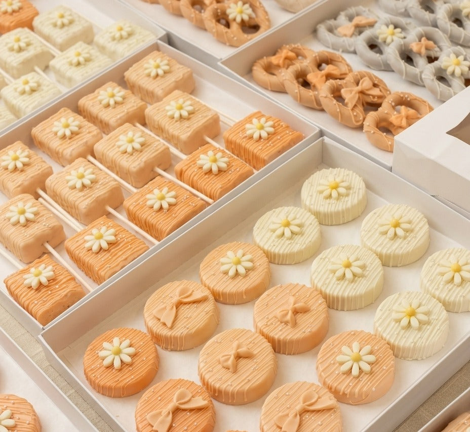 Party package treat assortment — decorated pretzels, Oreos and rice krispies